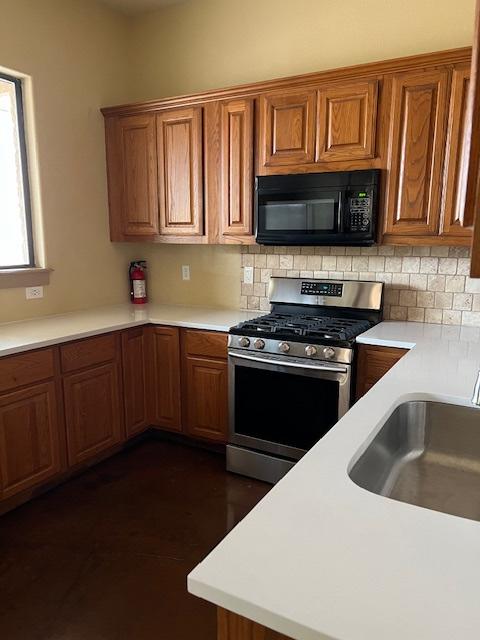 A kitchen set-up with a stove