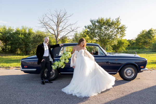 A groom looking at his bride