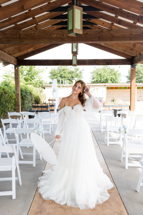 A bride fixes her hair