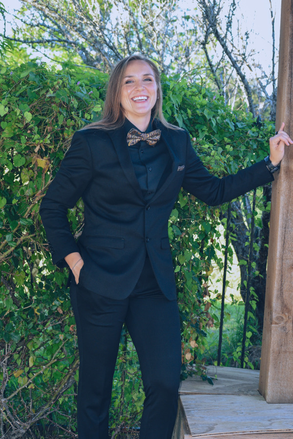 A woman smiling for her picture
