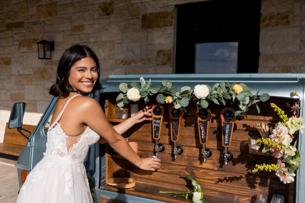 A bride gets her drink