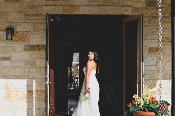 A bride looking back at the camera