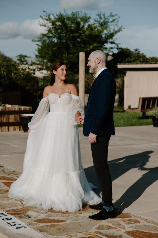 A groom and his bride looking at each other